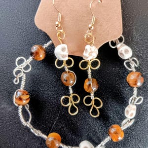 Wire Wrapped skull and tiger's eye bracelet and earrings