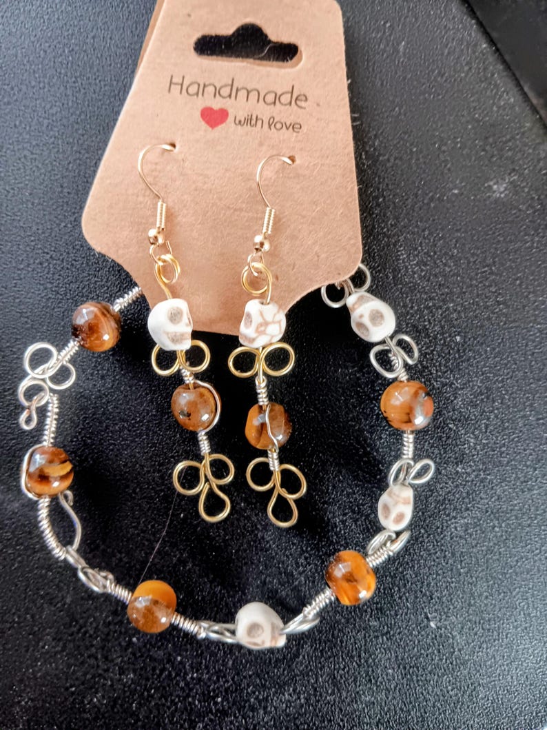 Wire Wrapped skull and tiger's eye bracelet and earrings